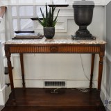 F11. Marble top table. 36”h x 50”w x 24”d 